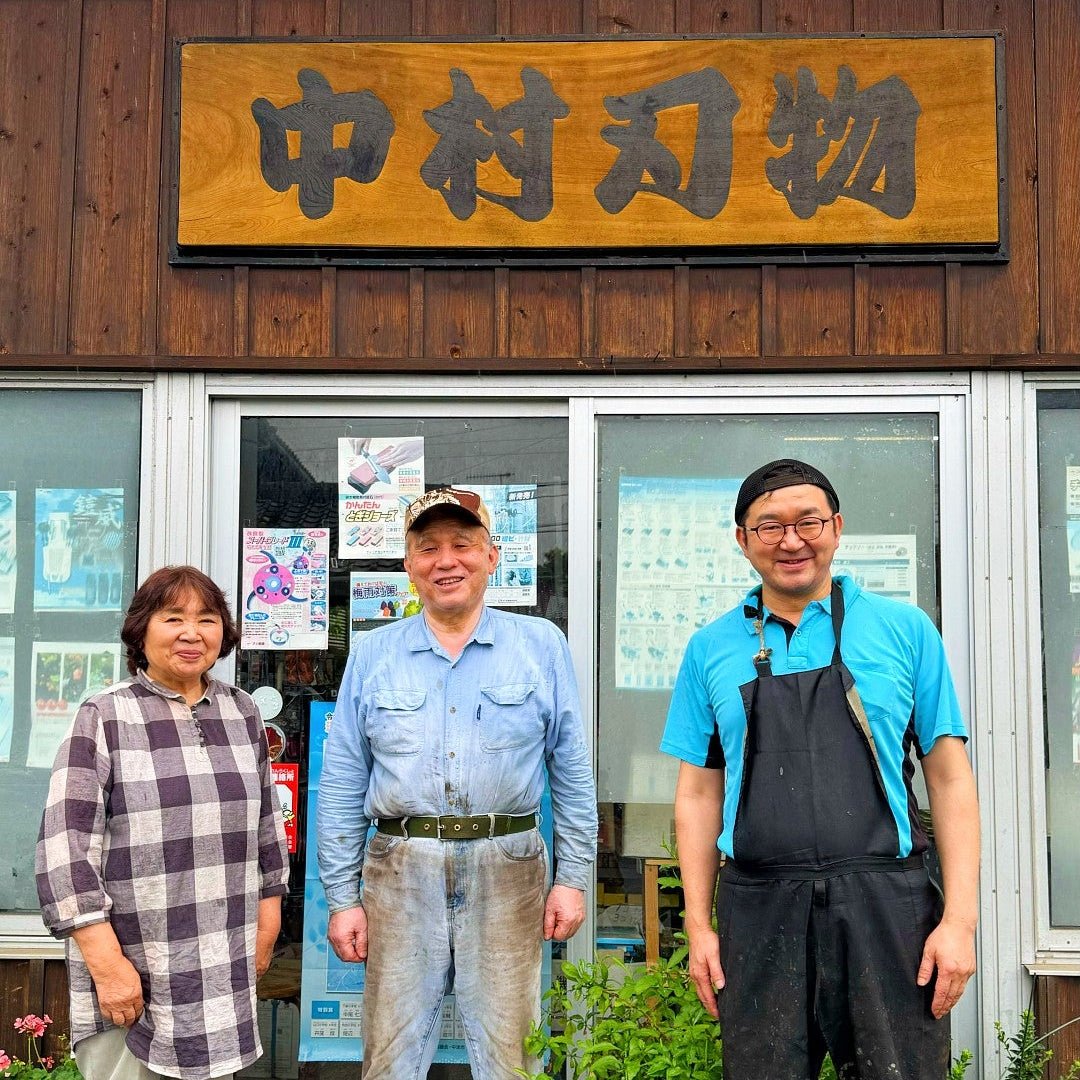 The 3 members of the Nakamura family in front of the  Nakamura Hamono workshop's entrance