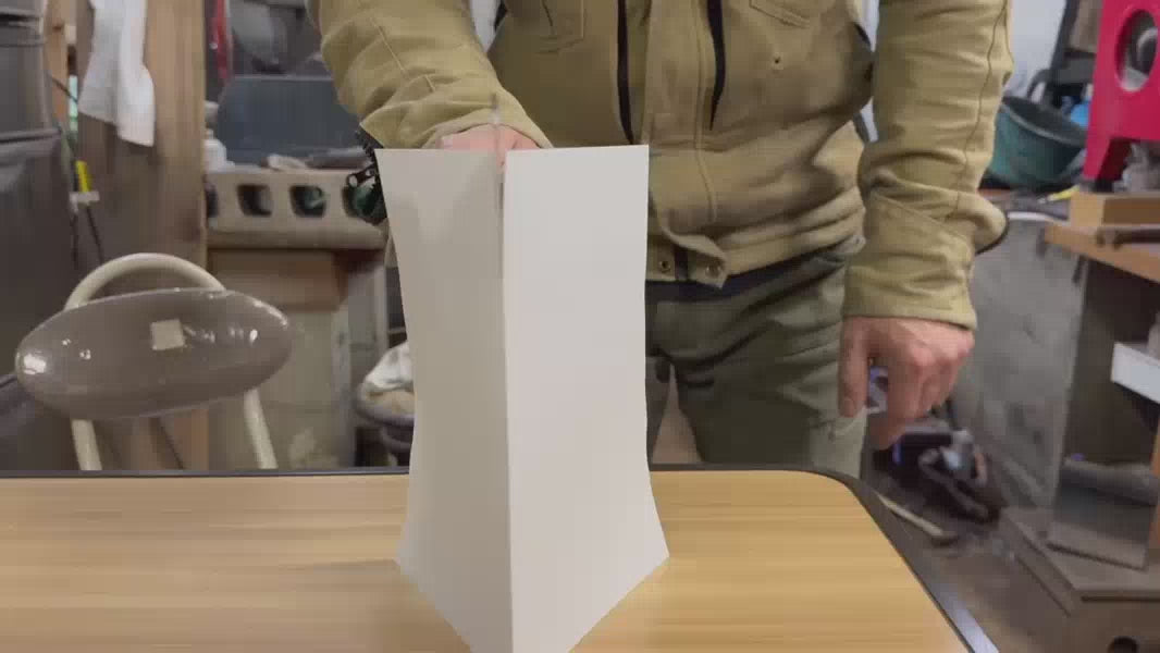 Clips of NIshida Hamono master craftsman cutting paper and making his knives in his workshops