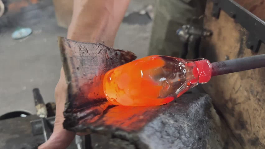 Soejima Glassware craftsman mold and blows heated glass