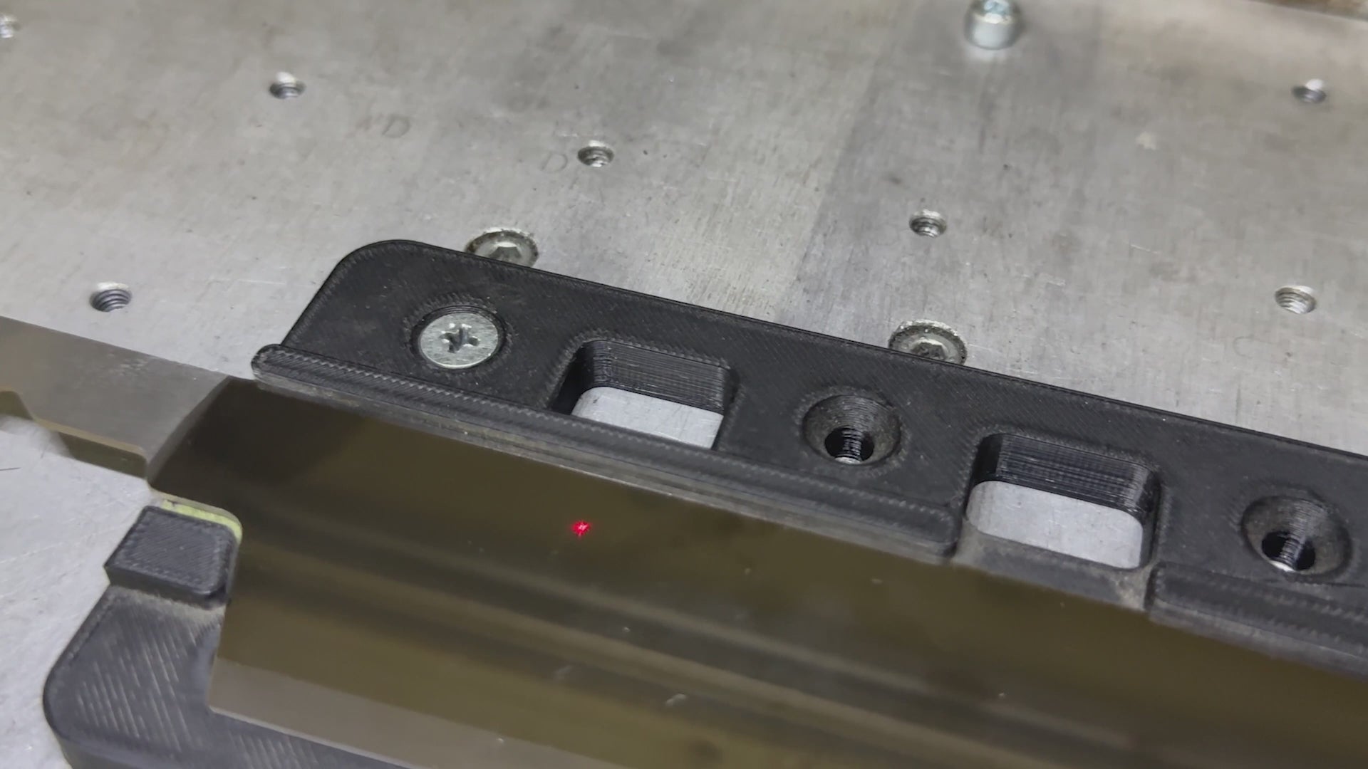 A KISEKI knife by Fukuda Hamono being engraved with laser